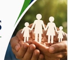 Hands holding paper family figures